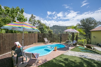 Private swimming pool and garden
