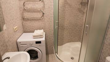 Hair dryer, bathrobes, towels, shampoo