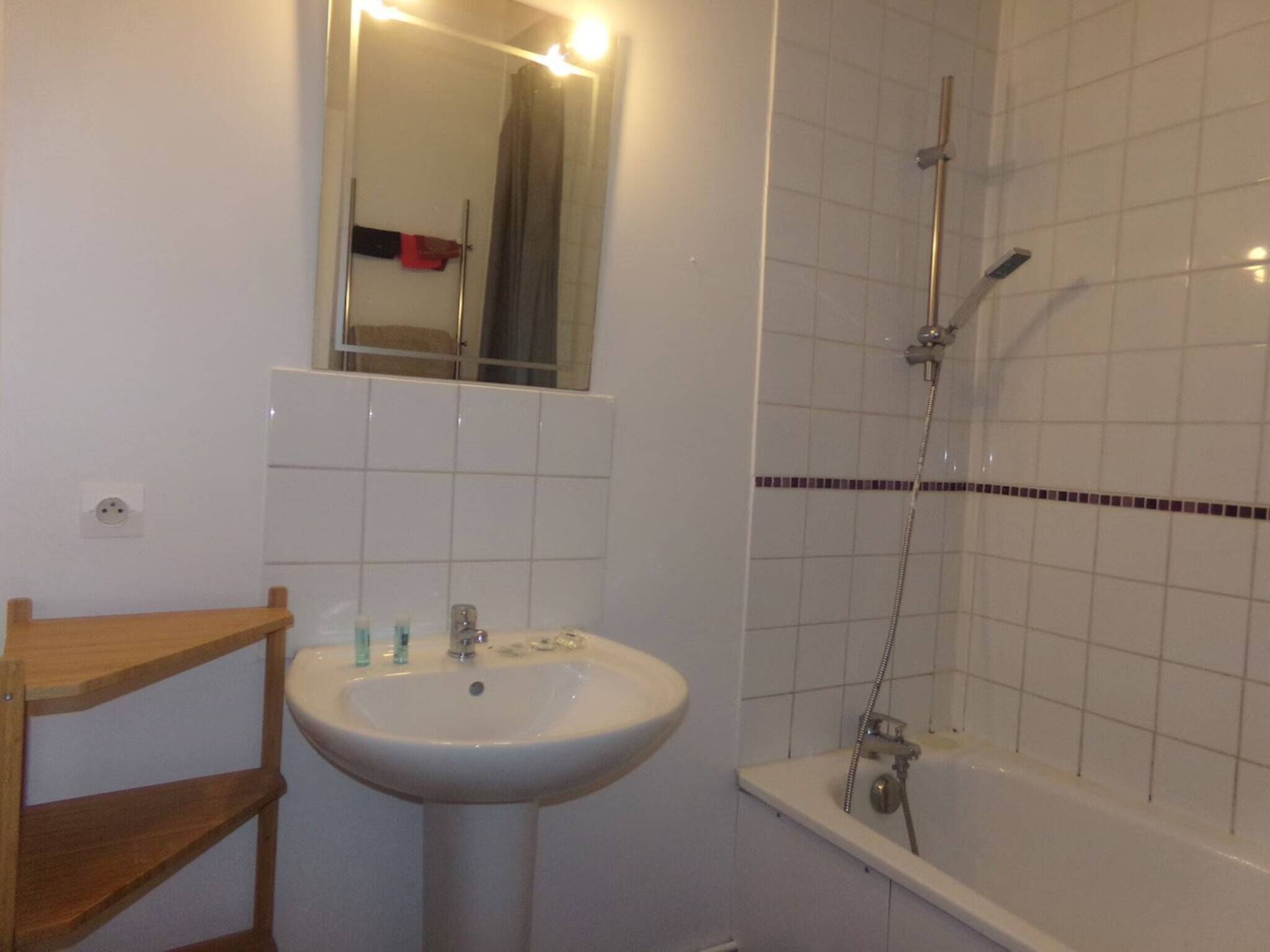 Bathtub, hair dryer, towels