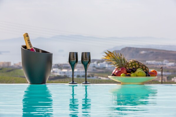 Outdoor pool, a heated pool, pool loungers