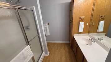 Bathtub, towels, toilet paper