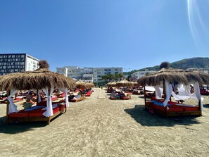 On the beach, beach towels