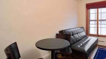 Chambre Double | Coin séjour