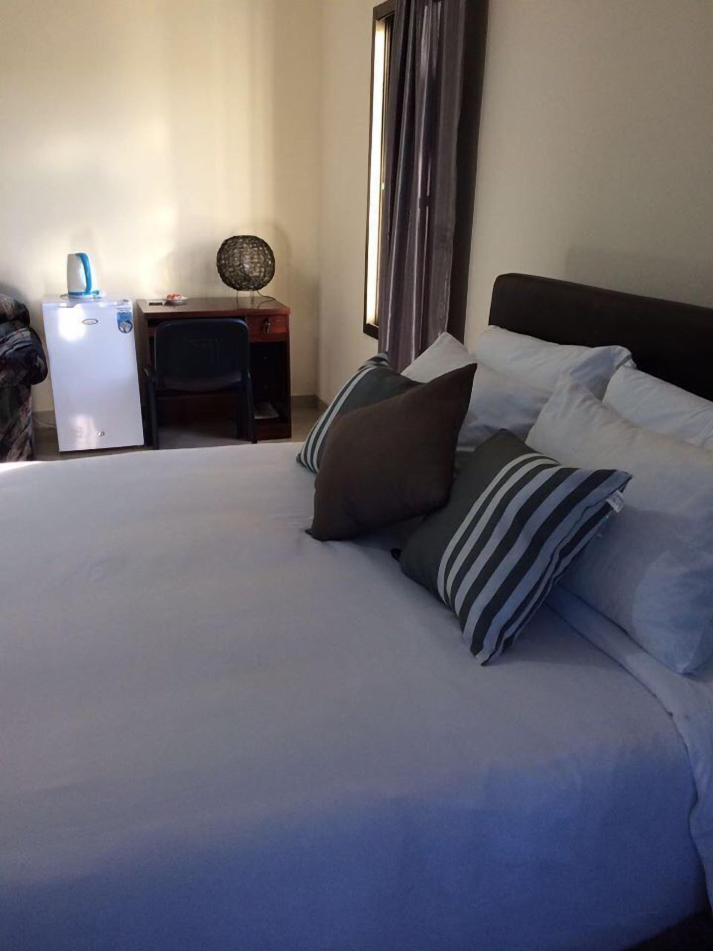 Double Room | Minibar, desk, laptop workspace, blackout drapes
