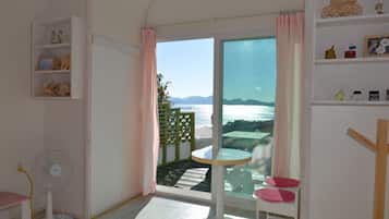Room (Tesoro) | Living area | 42-inch LCD TV with cable channels, TV