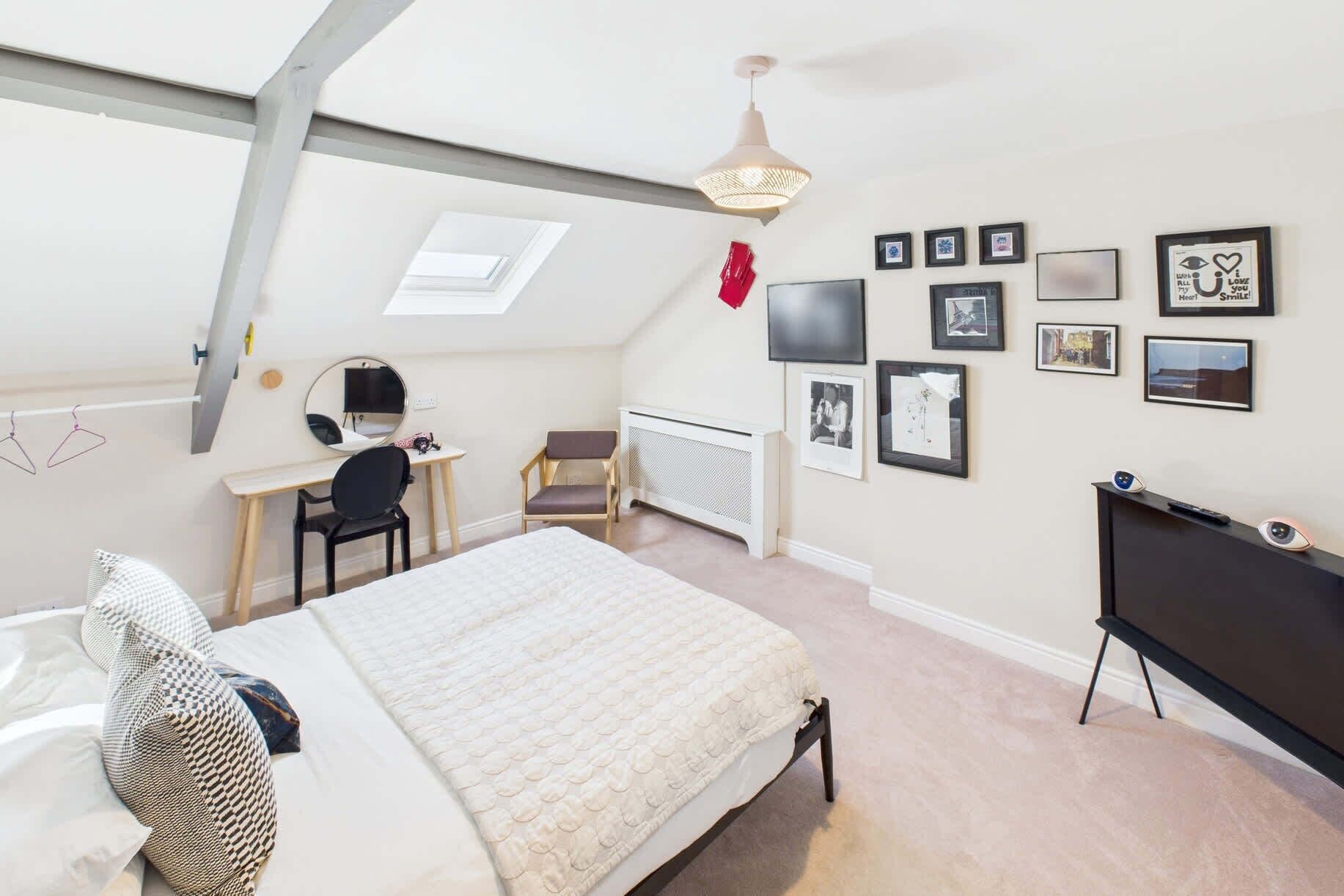 2 bedrooms, desk, blackout curtains, iron/ironing board