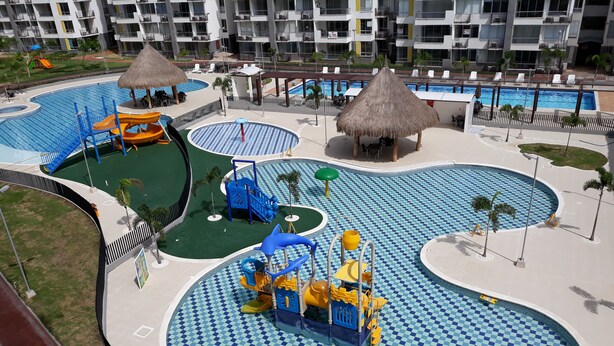 A water park with multiple pools, slides, and play structures. - Comfort, NATURE, REST AND FUN WITH THE FAMILY (RICAURTE CUNDINAMARCA)