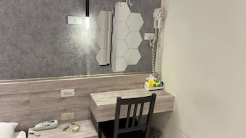 Desk, blackout drapes, free WiFi, bed sheets