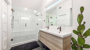 Combined shower/tub, hair dryer, towels, soap