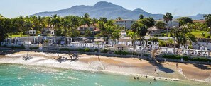 On the beach, sun loungers, beach towels