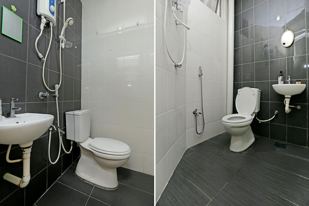 Habitación estándar doble | Baño | Ducha y cabezal de ducha tipo lluvia