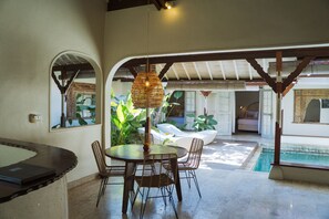 Happy Together Two Bedroom Private Pool Villa | Living area | 30-inch LCD TV with satellite channels, TV, DVD player