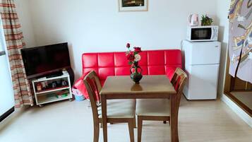 Apartment (605) | Living area | Flat-screen TV