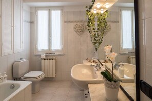 Shower, eco-friendly toiletries, hair dryer, bidet