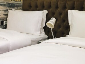 Deluxe Double or Twin Room | Minibar, in-room safe, desk, blackout curtains