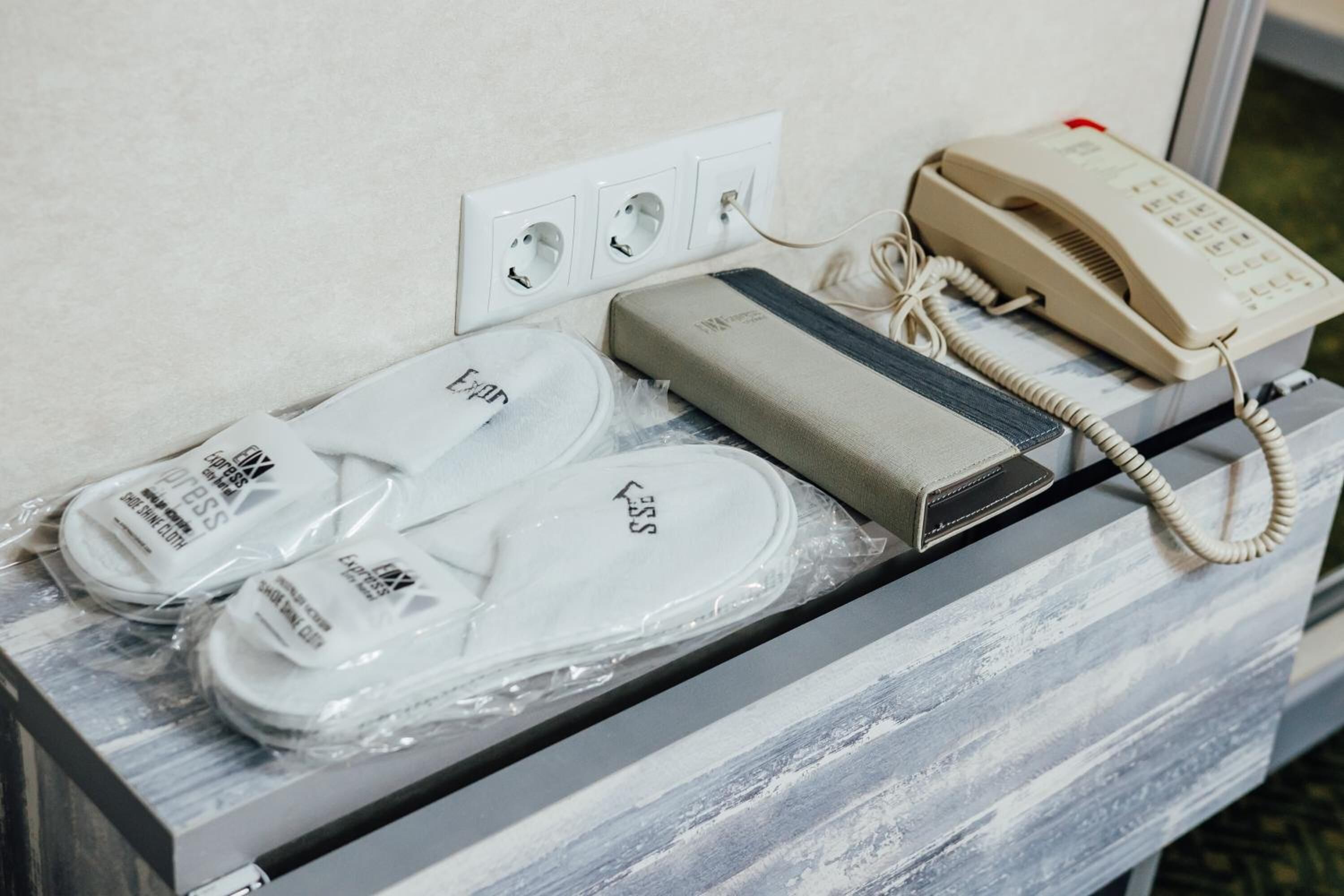 shower, hair dryer, bathrobes, slippers