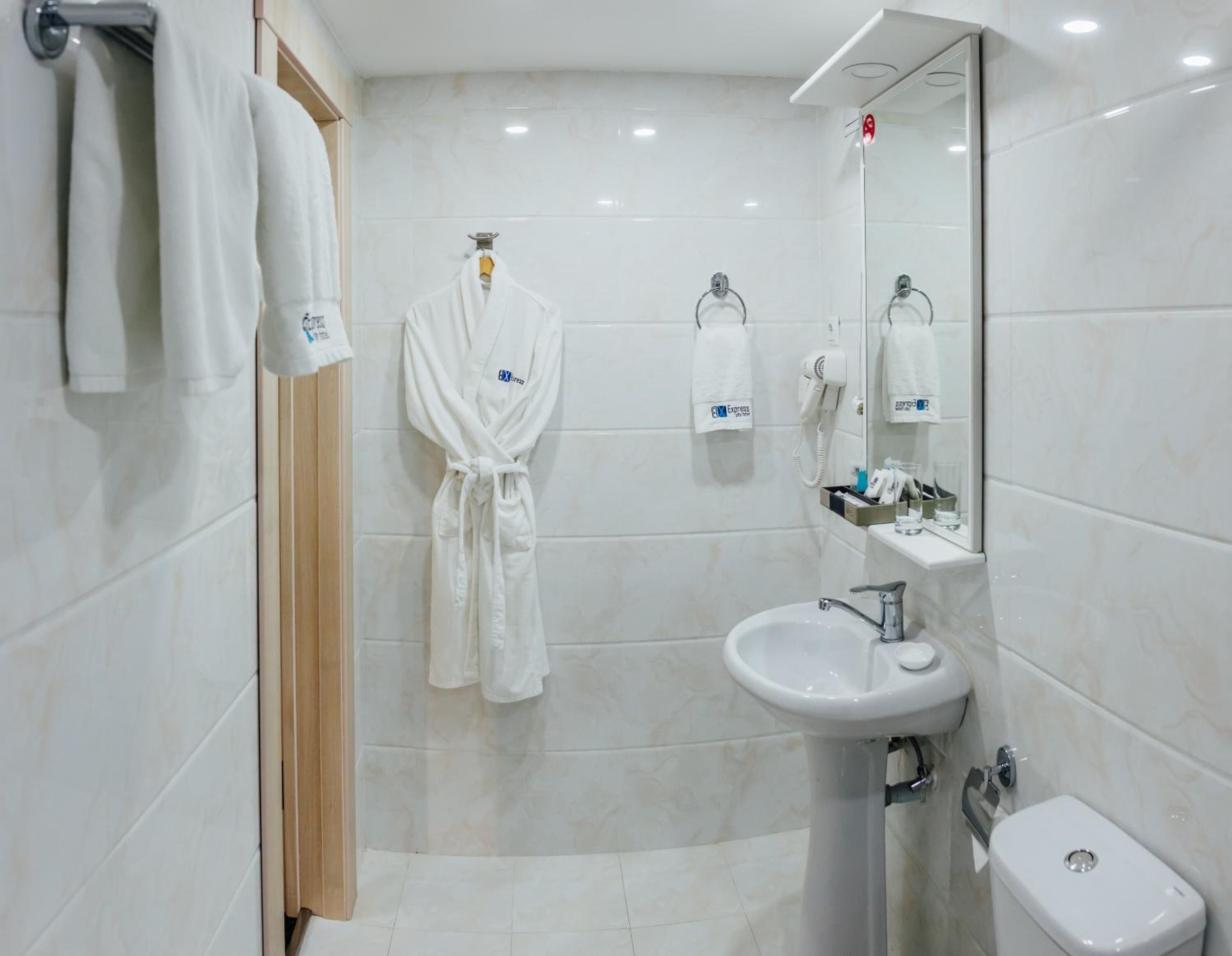 shower, hair dryer, bathrobes, slippers