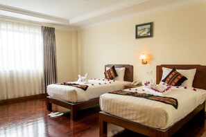 Superior Twin Room | Minibar, in-room safe, individually decorated, individually furnished