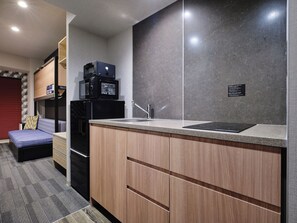 Coffres-forts dans les chambres, fer et planche à repasser