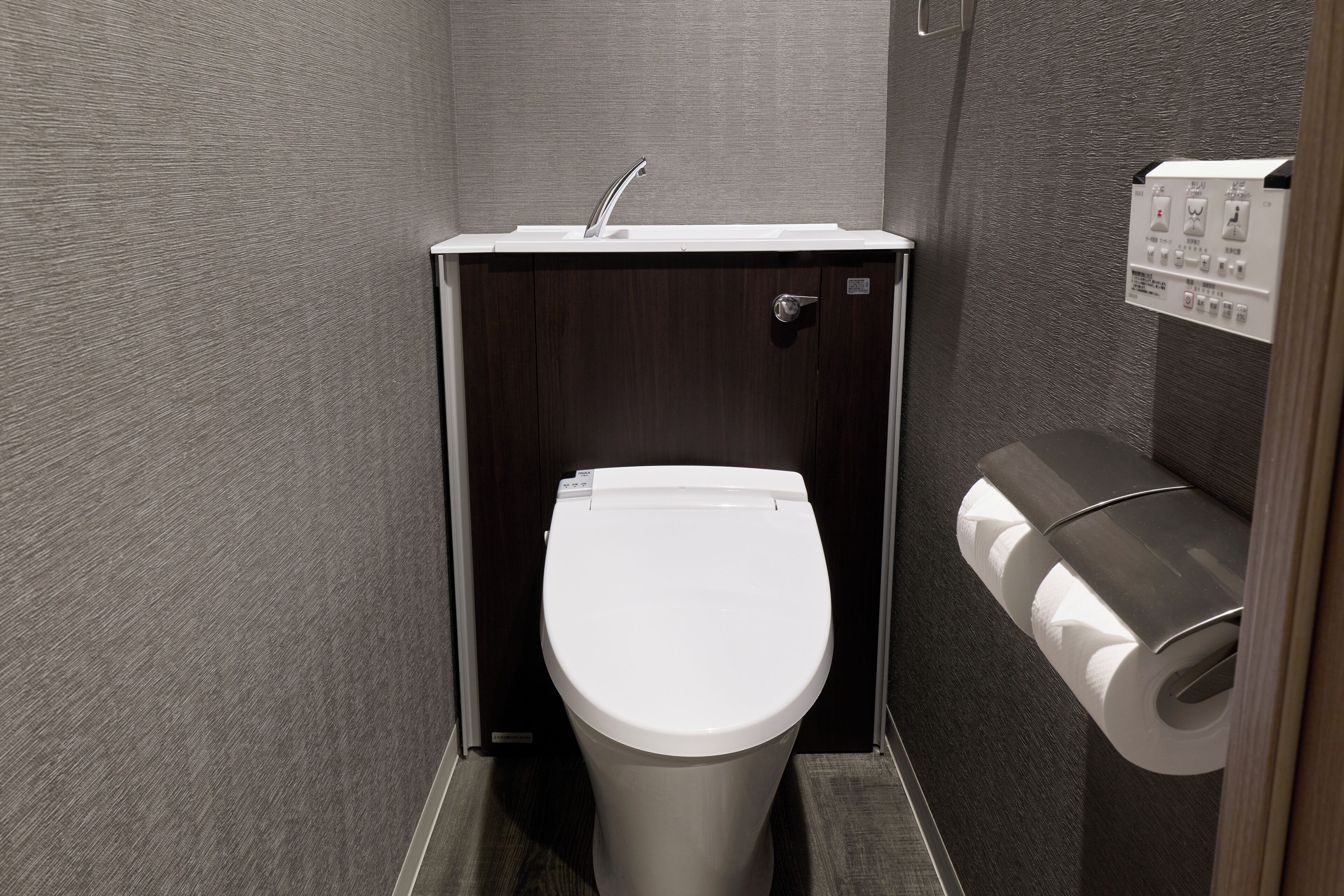 Separate tub and shower, hair dryer, slippers, bidet