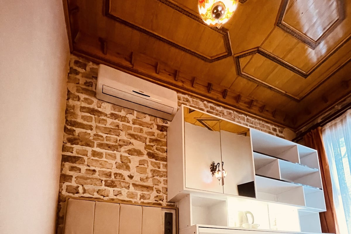 Standaard eenpersoonskamer | Een strijkplank/strijkijzer, babybedden, gratis wifi, beddengoed