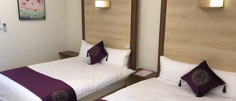 Standard Quadruple Room | Blackout drapes, free WiFi, bed sheets