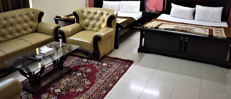 Deluxe Double Room | Living area | TV