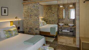 Suite, Garden View | 1 bedroom, minibar, in-room safe, individually decorated