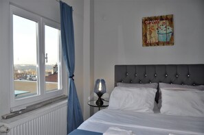 Penthouse Ville | Fer et planche à repasser, Wi-Fi gratuit, draps fournis