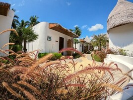 Deluxe Pool Villa | Free minibar items, in-room safe, desk, blackout drapes