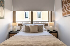 1 dormitorio, tabla de planchar con plancha, wifi y ropa de cama