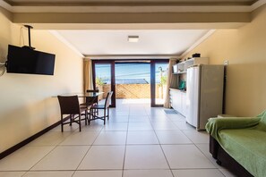 Classic Apartment | Living area | 37-inch flat-screen TV with cable channels, pay movies