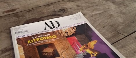 A magazine on a wooden table.