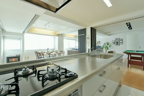Condo | Private kitchen | Fridge, microwave, stovetop, electric kettle - Ishiguro BLD (Sapporo)
