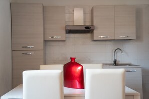 Apartment, 1 Bedroom | Private kitchen | Fridge, oven, stovetop, electric kettle
