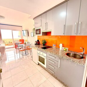 Fridge, microwave, oven, coffee/tea maker