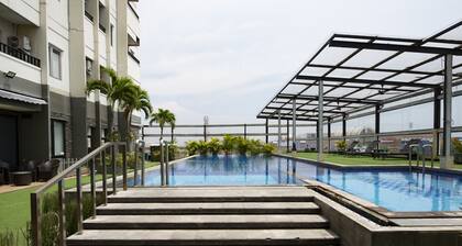 RedDoorz Apartment near Grand City Mall
