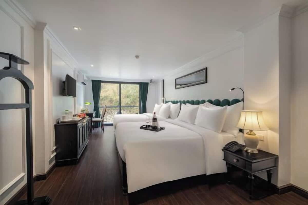 Hypo-allergenic bedding, pillow-top beds, minibar, in-room safe