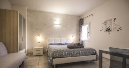 Spacious and bright gray room in country setting with pool