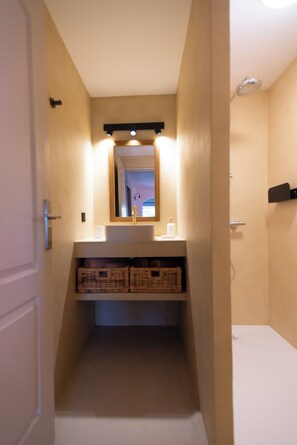 Bathtub, hair dryer, towels, soap