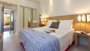 Sábanas italianas Frette, ropa de cama de alta calidad y minibar 
