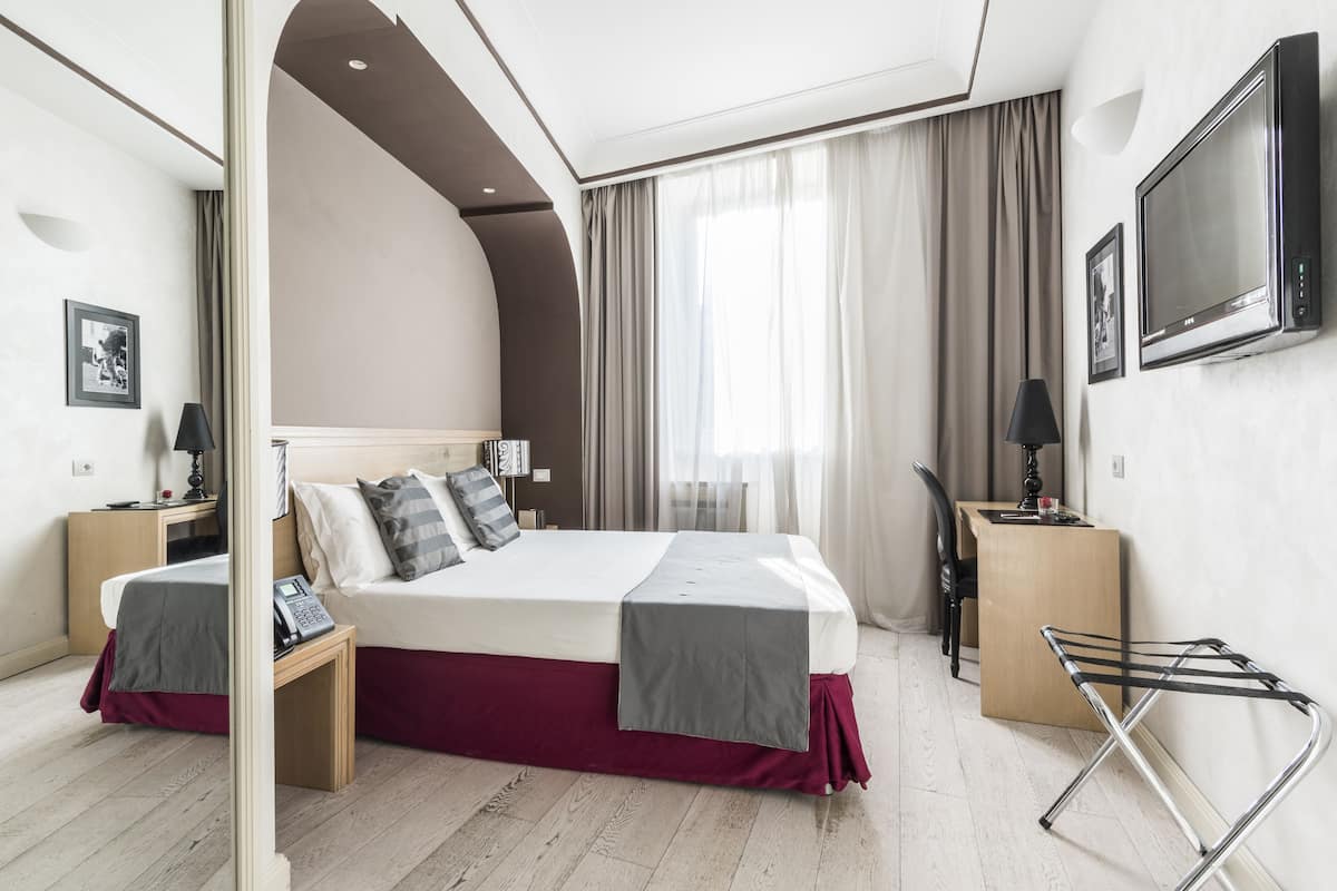Habitación doble ejecutiva | Sábanas italianas Frette, ropa de cama de alta calidad y minibar