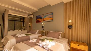 Habitación Deluxe con 2 camas individuales, no fumadores, vistas a la piscina | Caja fuerte, wifi gratis, ropa de cama