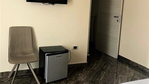 Luxe vierpersoonskamer | Televisie
