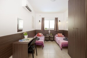 Apartment, 3 Bedrooms, Terrace | 3 bedrooms, desk, laptop workspace, blackout drapes