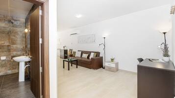 Apartment, 2 Bedrooms (1) | Living area | 40-inch LED TV with satellite channels, TV