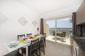 Superior Apartment, 2 Bedrooms (1) | Dining room - Summer Breeze Superior Apartment with Terrace by Getaways Malta (Mellieha)