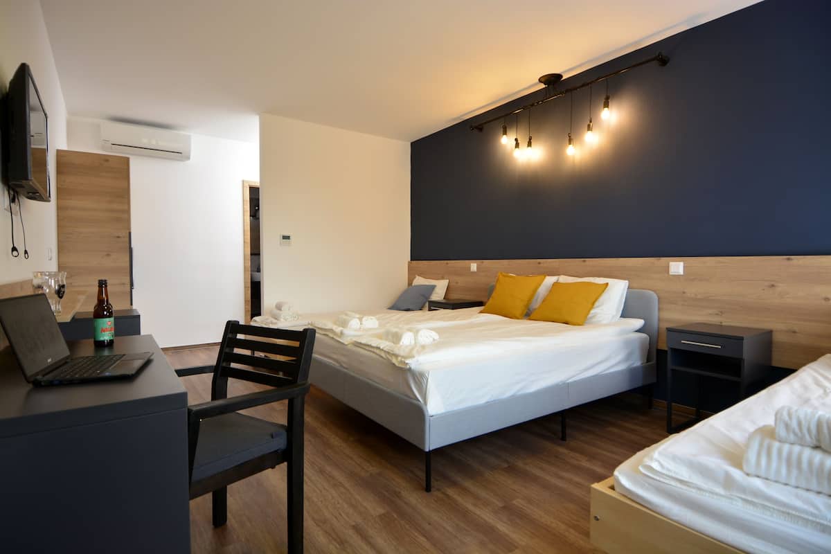 Quadruple Room, Bathtub | 1 bedroom, minibar, in-room safe, desk