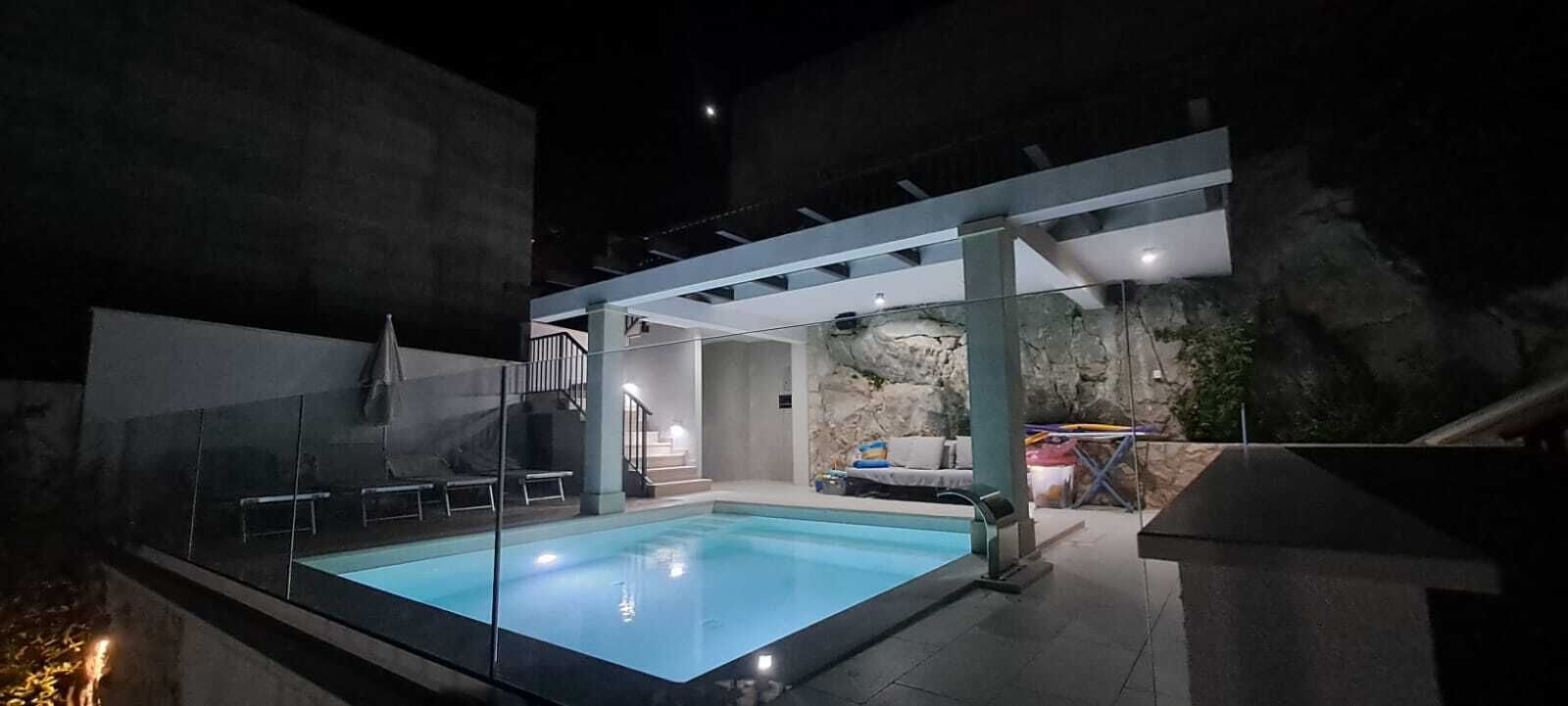 Seasonal outdoor pool, open 8:30 AM to 8:30 PM, pool umbrellas