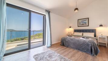 Apartment, Sea View (Penthouse) | 2 bedrooms, down comforters, in-room safe, individually decorated